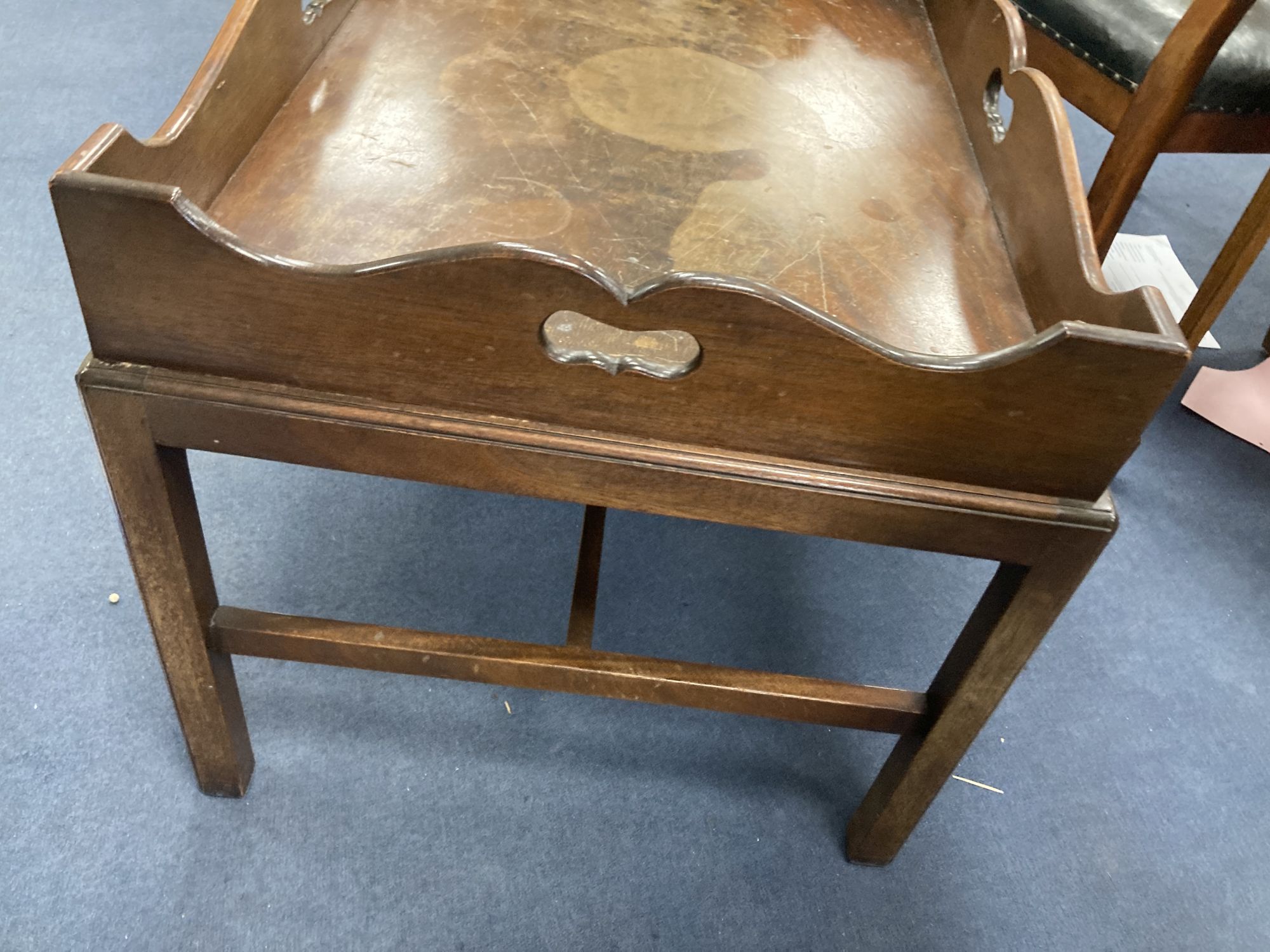 A butlers tray table, width 78cm depth 56cm height 54cm, and a Georgian mahogany stool